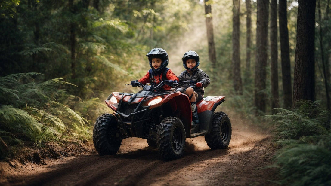 Two children riding a youth ATV on a forest dirt trail, wearing helmets and safety gear