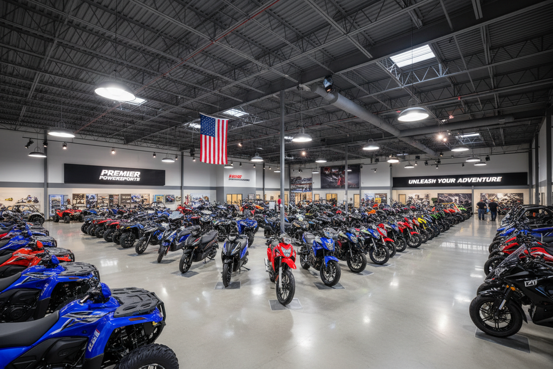 Large showroom displaying ATVs, dirt bikes, and motorcycles in a spacious dealership