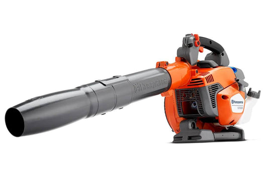 Orange and gray Husqvarna 525BX handheld leaf blower on white background
