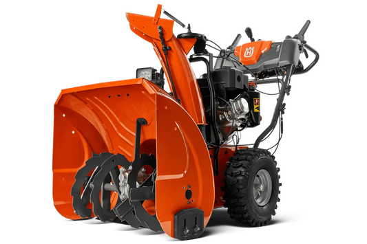 Heavy-duty orange snow blower with large augers and control panel on display