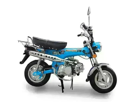 Blue 125cc mini motorcycle with chrome details and black seat on a white background