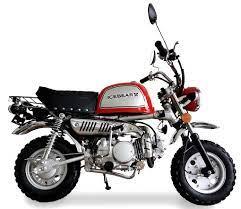Red and white mini motorcycle with rugged tires and chrome details on a white background