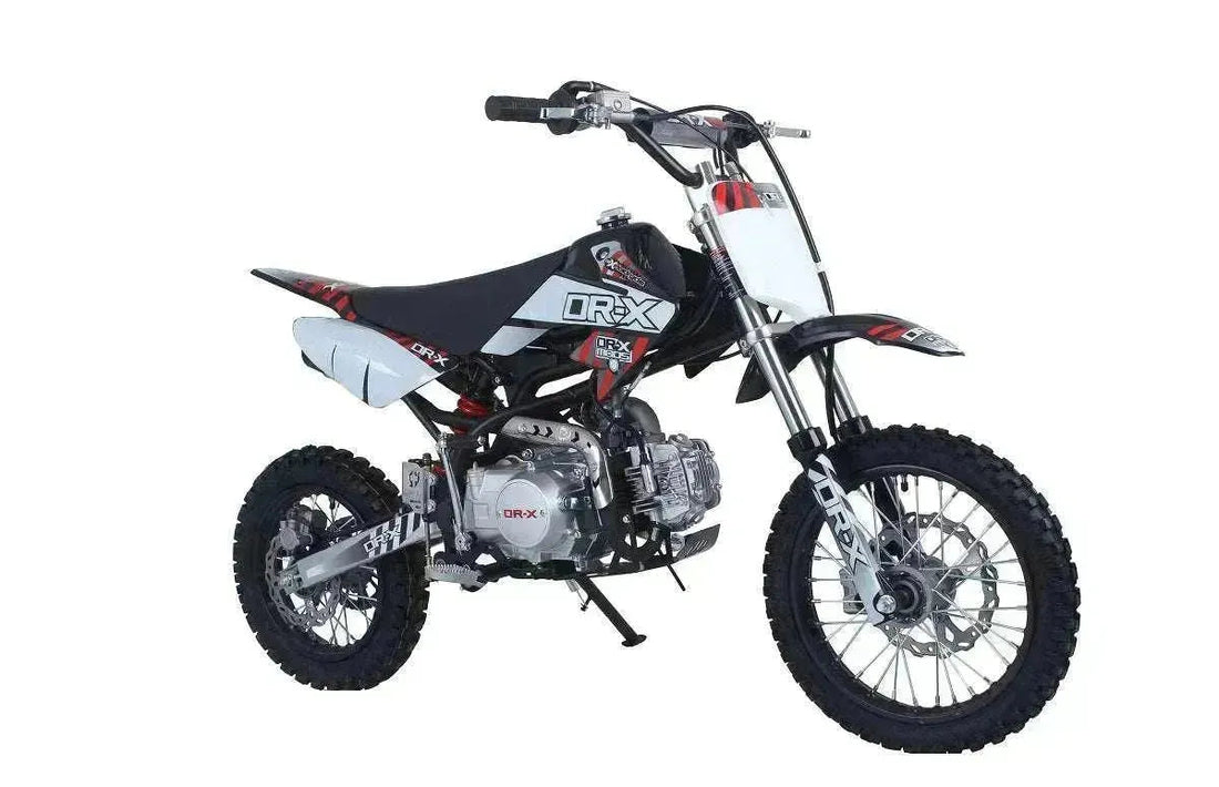 Black and white 125cc youth dirt bike with off-road tires, shown on a plain background