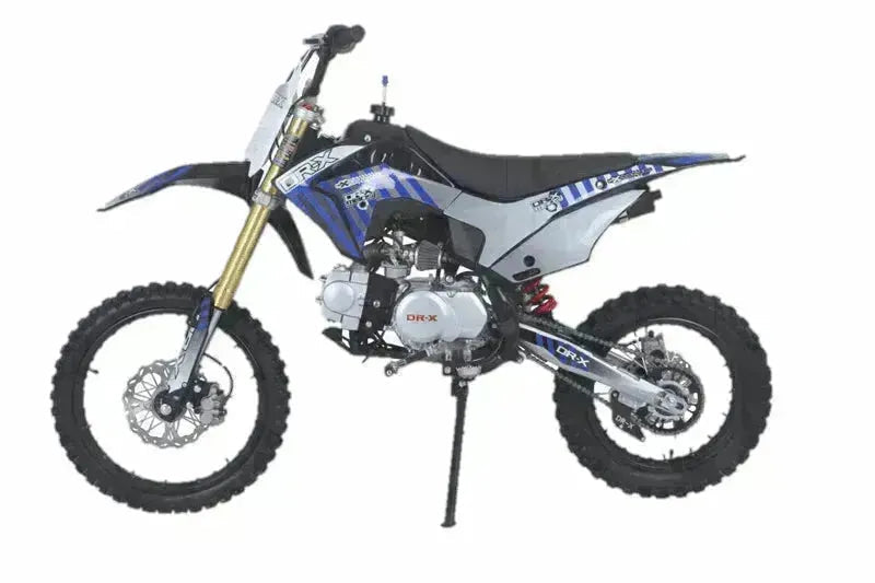125cc youth dirt bike with blue and black graphics, off-road tires, side view