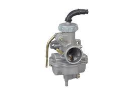 ATV carburetor with riveted float bowl on white background, essential small engine part