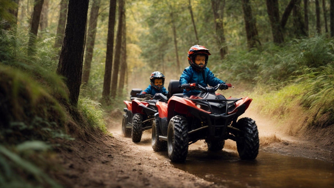 Two kids in helmets riding red all-terrain vehicles on a forest trail with dirt and water