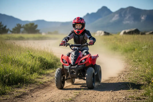Child riding red ATV on dirt trail outdoors, wearing helmet and protective gear
