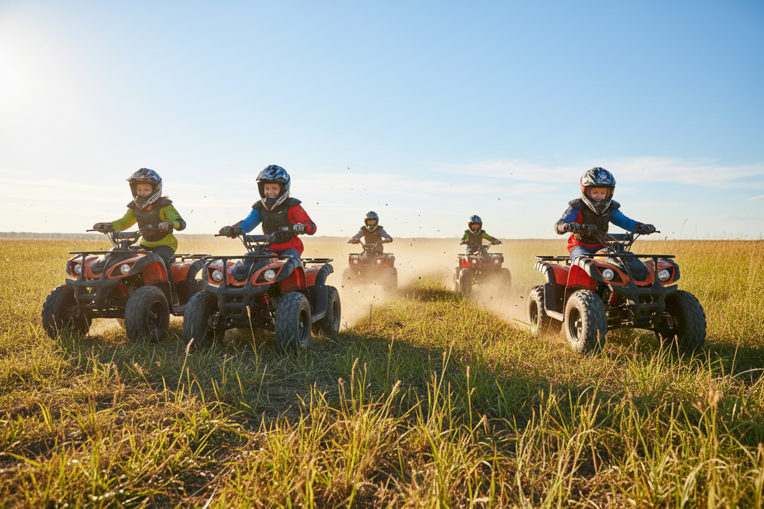Kids riding ATVs across grassy field, wearing helmets and safety gear outdoors