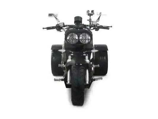Front view of black Maddog 50cc trike scooter with dual headlights and wide rear tires