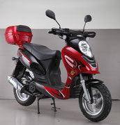 Red motor scooter with storage box parked indoors, affordable scooter for adults