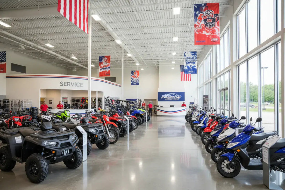 Showroom with ATVs, dirt bikes, and scooters on display in a bright powersports dealership