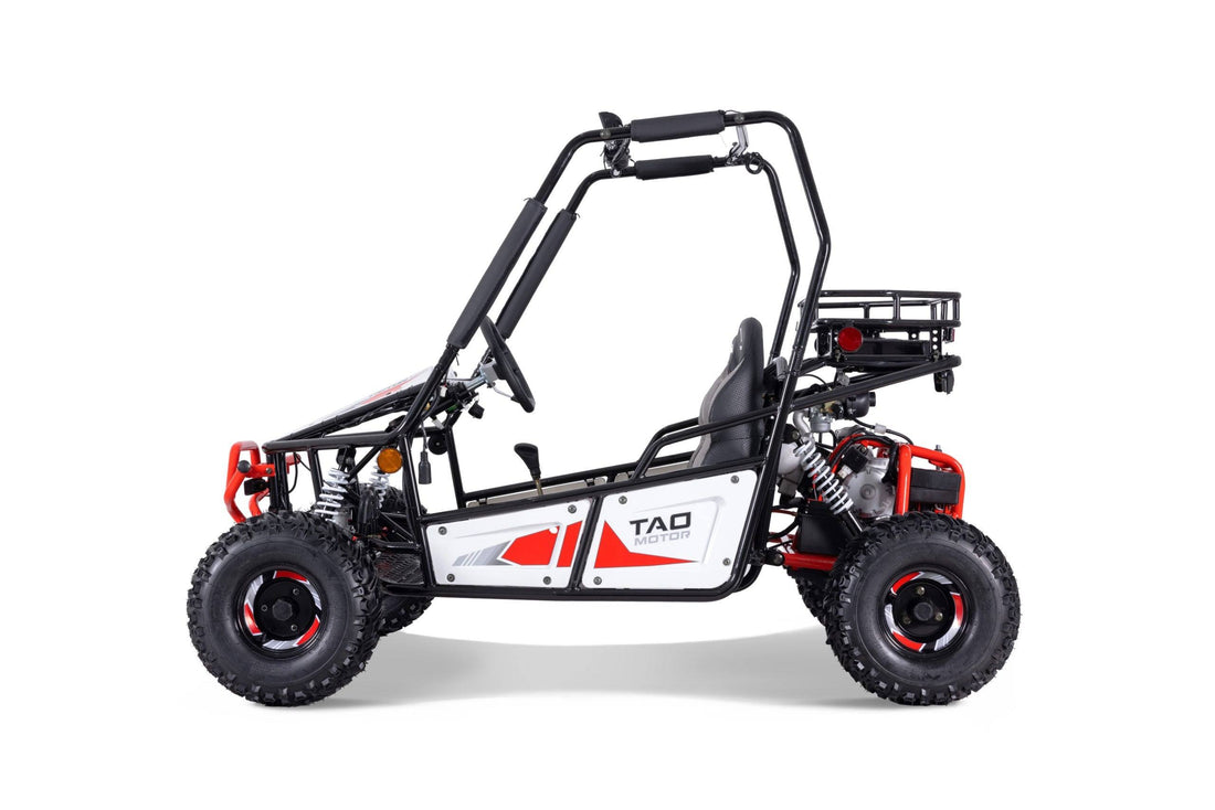 Side view of a single-seat 125cc go-kart with off-road tires and roll cage on white background