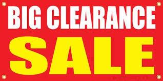 Red and yellow banner with big clearance sale text for ATVs, dirt bikes, go-karts deals