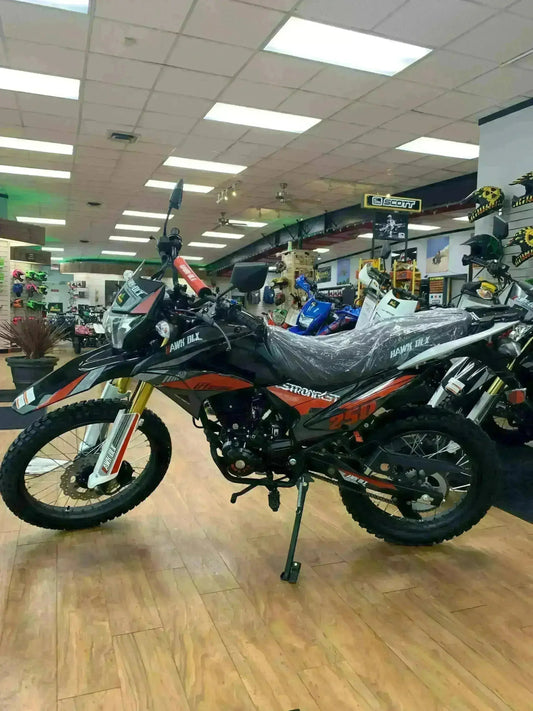 RPS Hawk DLX 250 dual sport motorcycle on showroom floor with off-road tires