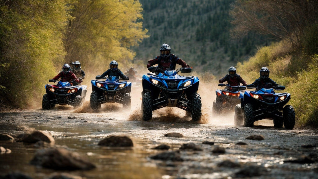 Group of riders on blue ATVs driving through a muddy trail in a forested area