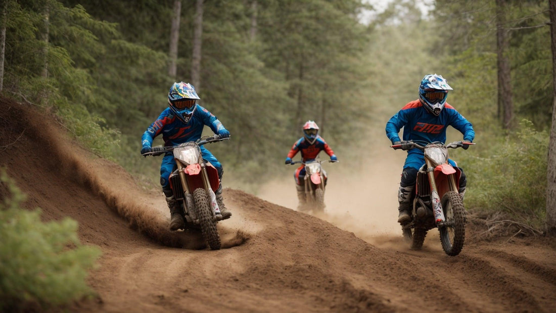 Riders on gas-powered dirt bikes racing on a forest trail, kicking up dirt and dust.