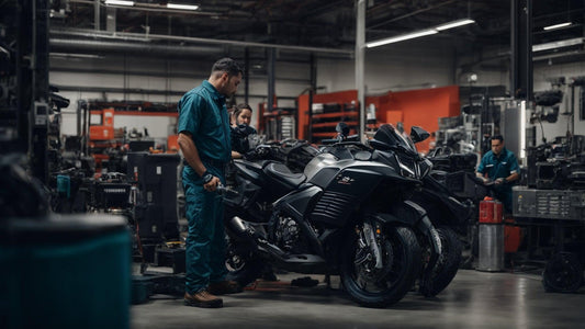 Powersports technicians servicing a sport motorcycle in a well-equipped workshop