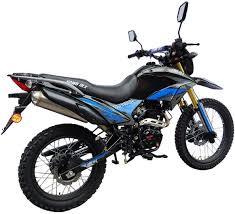 Blue and black 250cc dirt bike with knobby tires and street-legal features for beginners