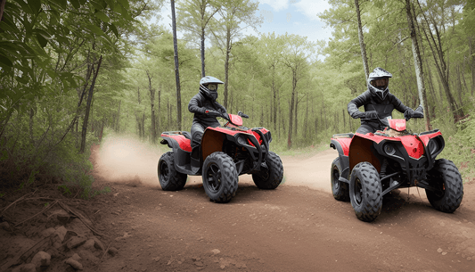 Two riders on red ATVs driving on a dusty forest trail surrounded by green trees.