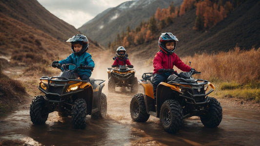 Kids riding youth ATVs on a muddy trail in the mountains, wearing helmets and jackets