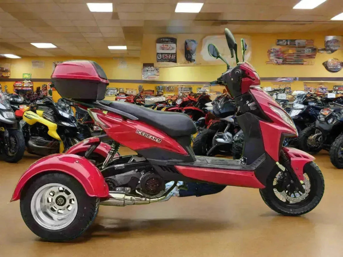 Red Icebear three-wheeled 150cc trike scooter in showroom with storage box, surrounded by motorcycles