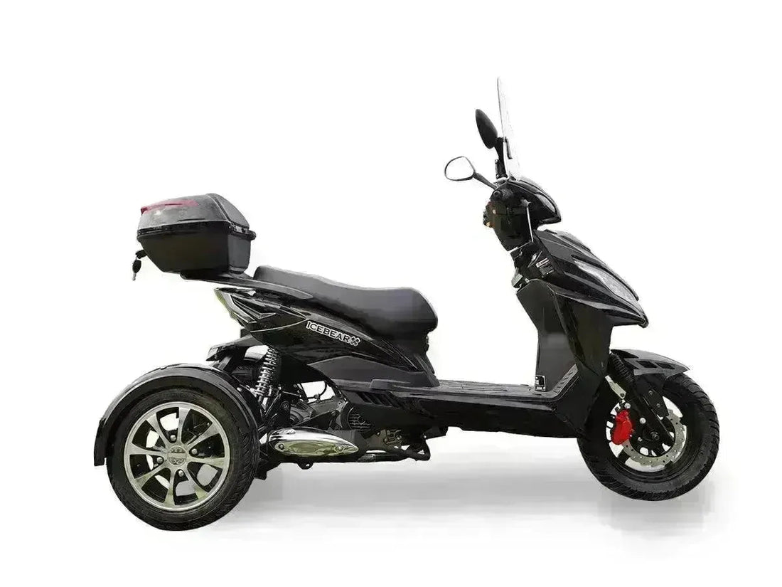 Black three-wheeled 50cc trike scooter with rear trunk, side view on white background