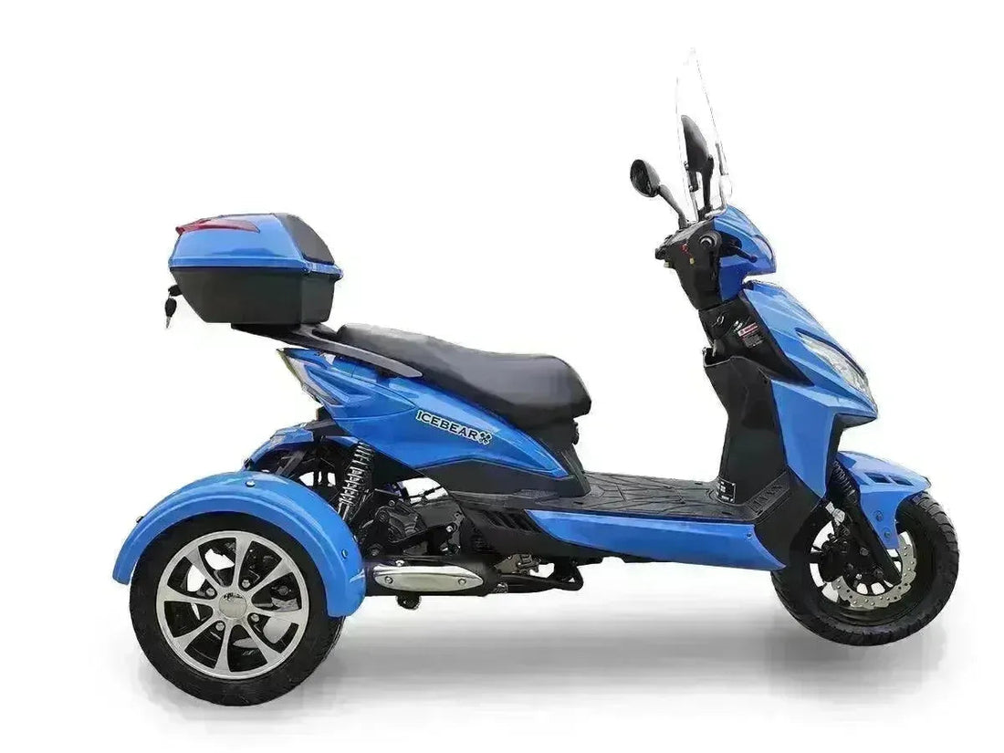 Blue 3-wheel 50cc trike scooter with rear storage box and windshield on white background