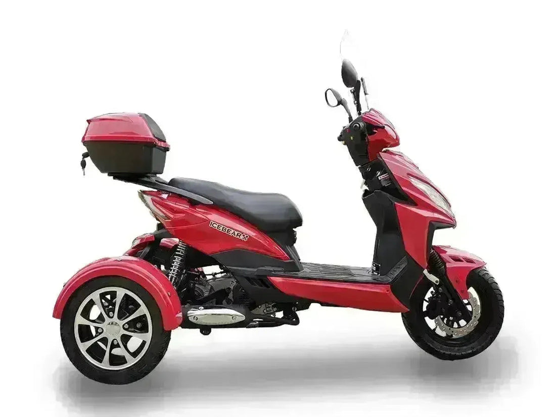 Red three-wheeled 50cc trike scooter with storage box, side profile on white background