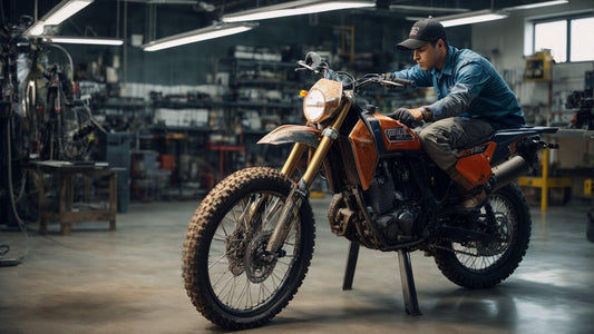 Technician inspecting orange dirt bike in a well-lit powersports repair shop workshop