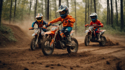 Kids riding dirt bikes on an outdoor dirt trail in full safety gear and helmets