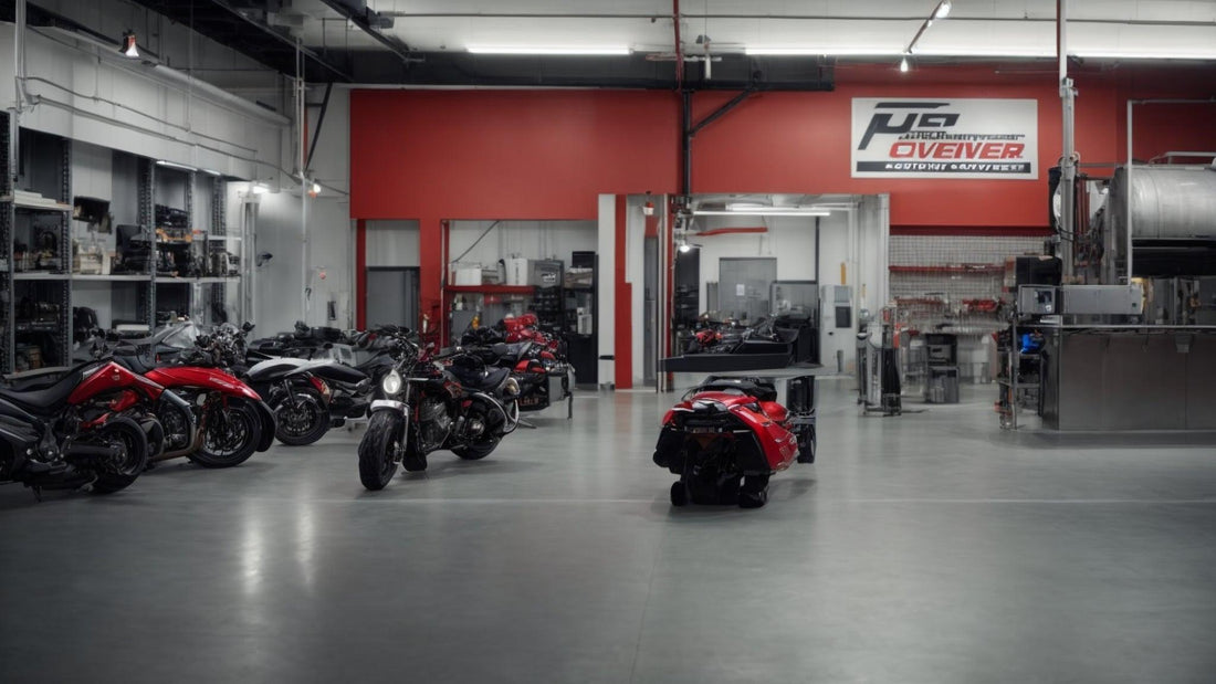 Clean powersports service center with red and black motorcycles and ATVs on display