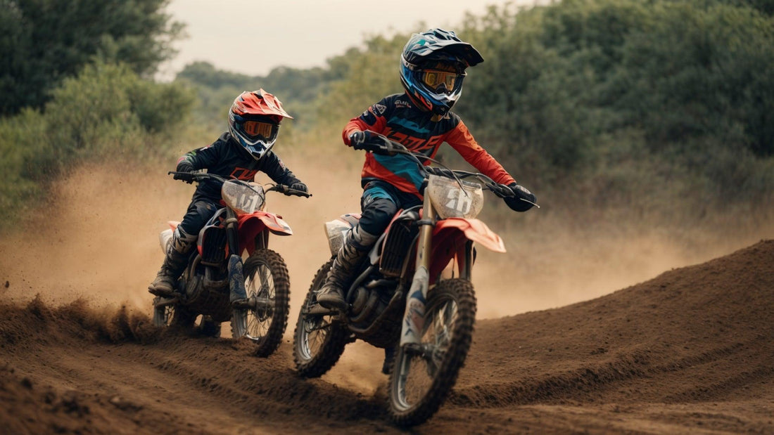 Two kids riding dirt bikes on a muddy off-road trail, wearing protective gear