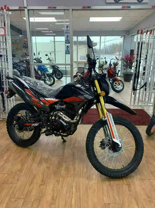 Street legal RPS Hawk DLX 250 dual sport motorcycle on showroom floor with off-road tires
